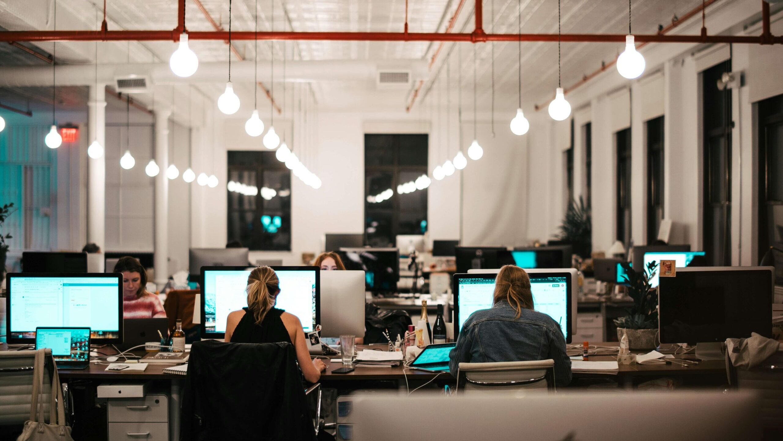 Image of workers in an open-plan office